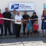 On Tuesday, July 30 at 1 p.m., some 40 people came out to enjoy a ribbon cutting and dedication as the USPS, Sam Bharta and the community of Crescent Valley celebrated