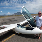 Three glider pilots sat in the hanger of the Ely airport last Friday. Janos Sindely, a Hungarian pilot who travelled from China to visit Ely discussed
