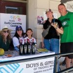 The Eureka Boys and Girls Club offers wine tastings to passersby at the 2026 Art, Wine and Music Fest on Sept. 19.